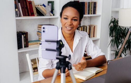 Woman participating in a video interview.